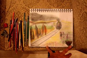 We all have to start somewhere. I spent a fair amount of time creating the smoke from the engine with a piece of charcoal chalk. I was having a hard time creating landscape to the left of the Steam Train. So I just started adding colorful fall trees like a maniac  : ) .  